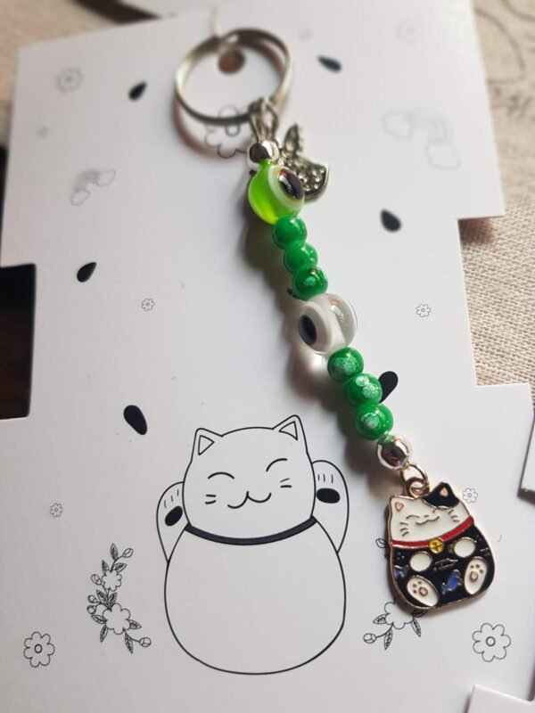 Llaveros Neko dije Metal , 7chakras y ojo turco