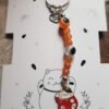 Llaveros Neko dije Metal , 7chakras y ojo turco