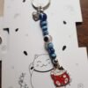 Llaveros Neko dije Metal , 7chakras y ojo turco
