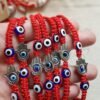 Pulseras Hilo rojo con mano Fatima y Ojo Turco