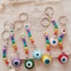 Nuevos Chi Llaveros 7 Chakras y dije Ojo turco Color con Hamsa