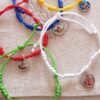 Pulseras hilo 7 nudos y Medallitas