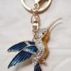 2025/12/1002427783.jpg Llaveros Colibrí Nuevos estrass